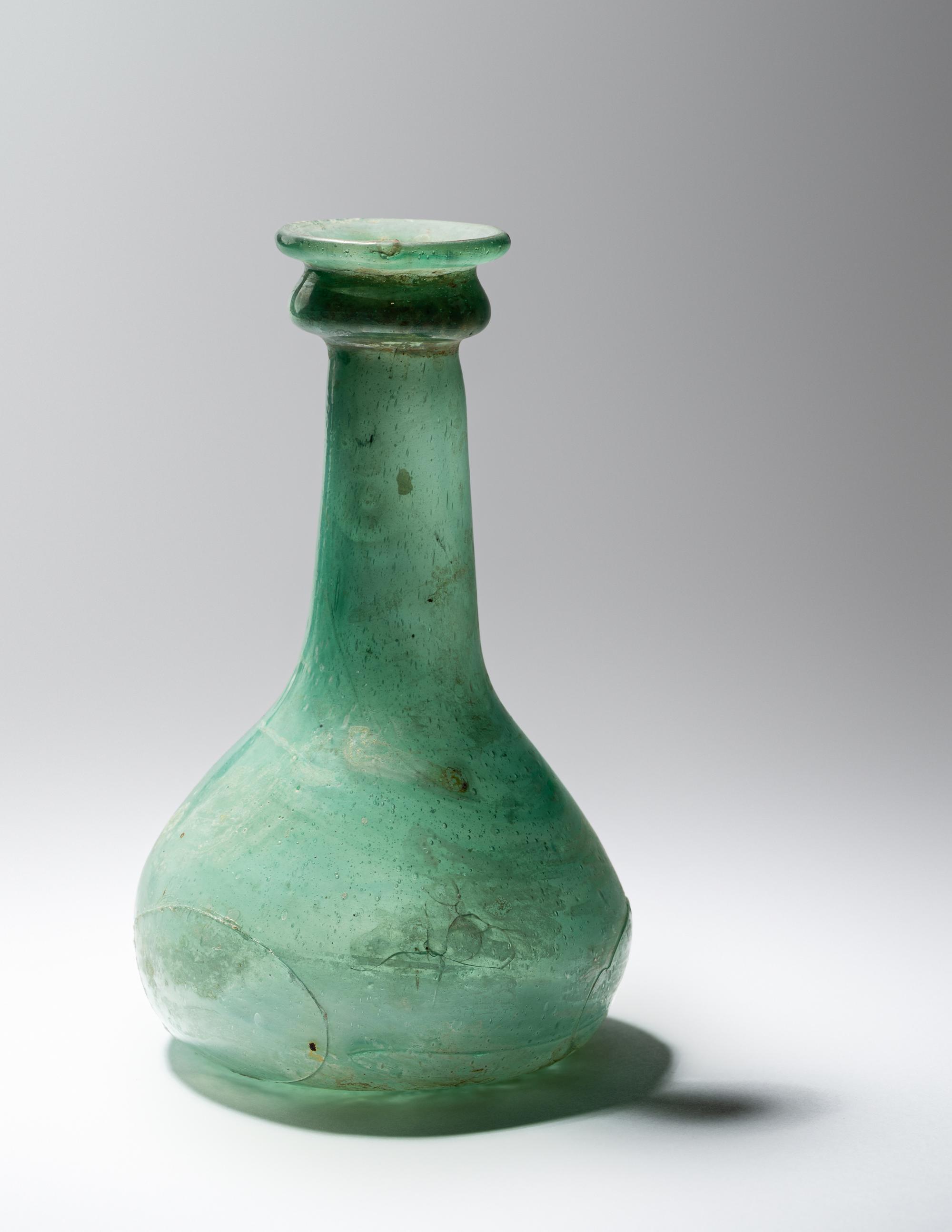 A Parthian Green Glass Bottle