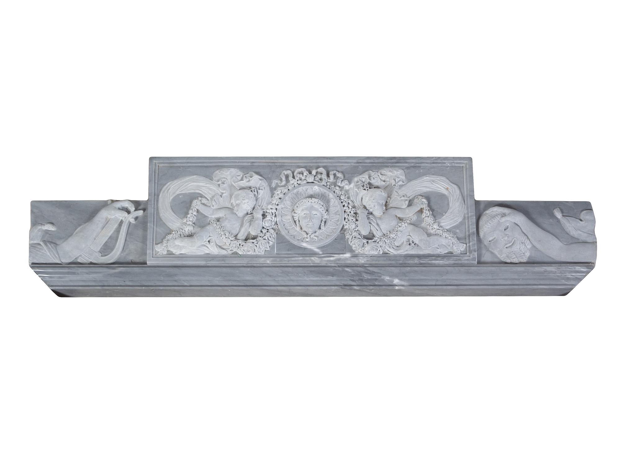 An Italian Carved Bardiglio Imperiale Marble Chimneypiece