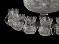 An Edinburgh Crystal Thistle Footed Punchbowl and Eight Punch Cups
