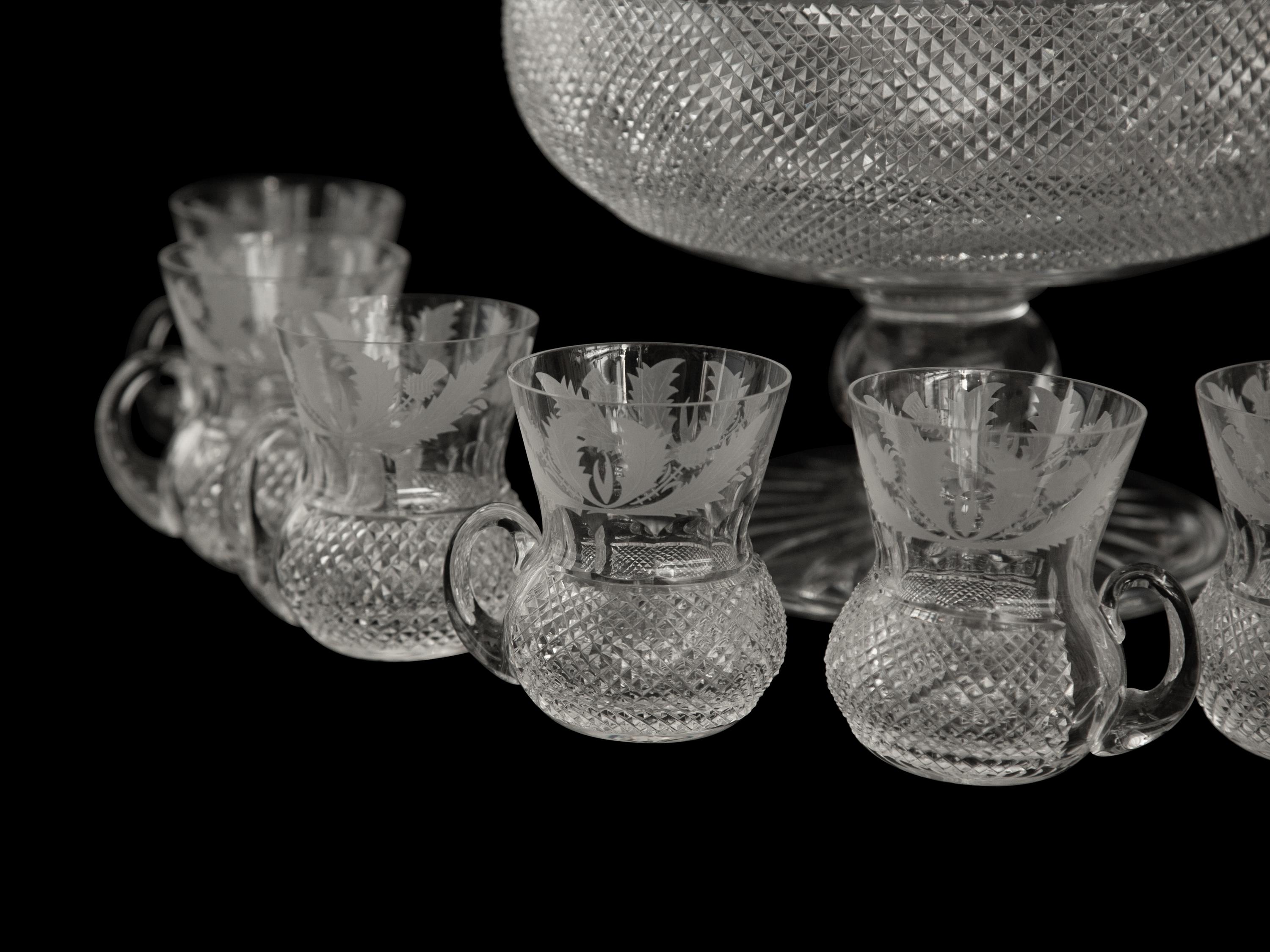 An Edinburgh Crystal Thistle Footed Punchbowl and Eight Punch Cups
