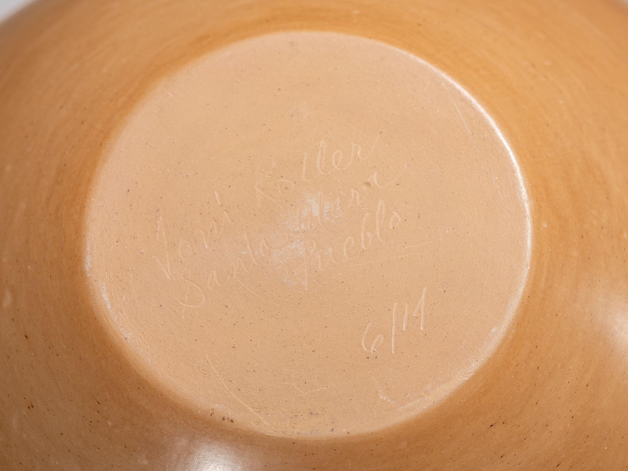 Carved Buffware Pottery Jar
