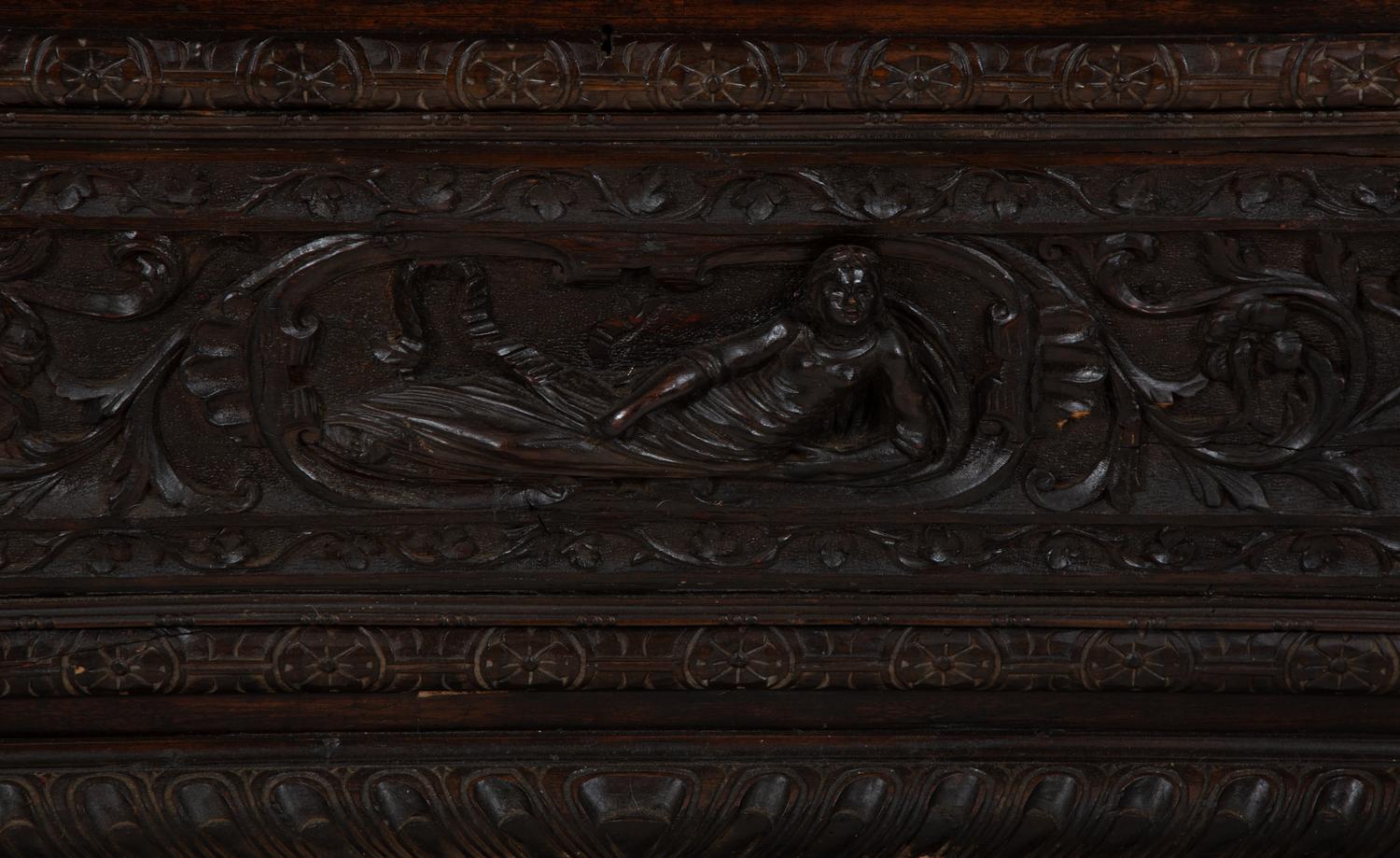 An Italian Renaissance Revival Carved Oak Cassone