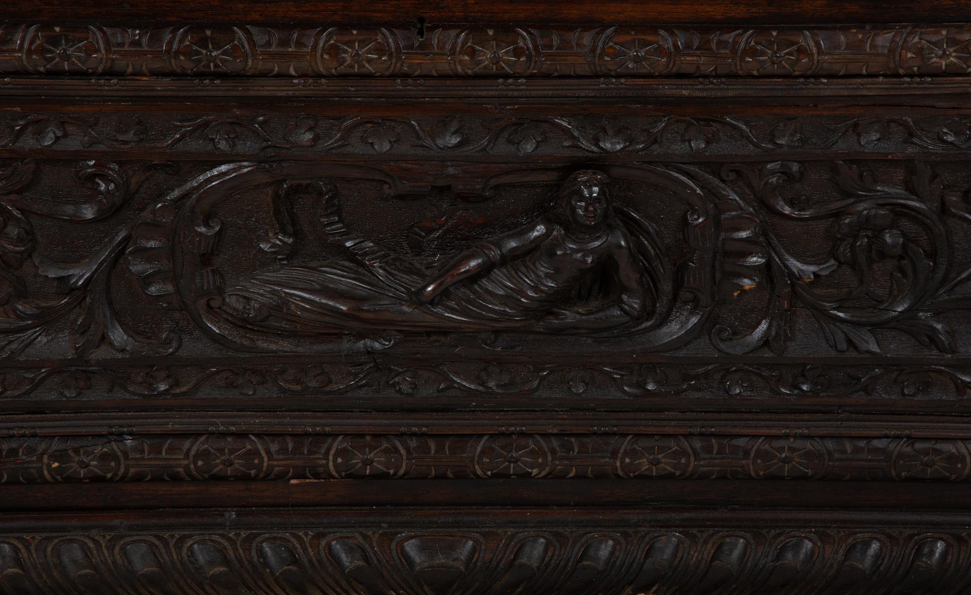 An Italian Renaissance Revival Carved Oak Cassone