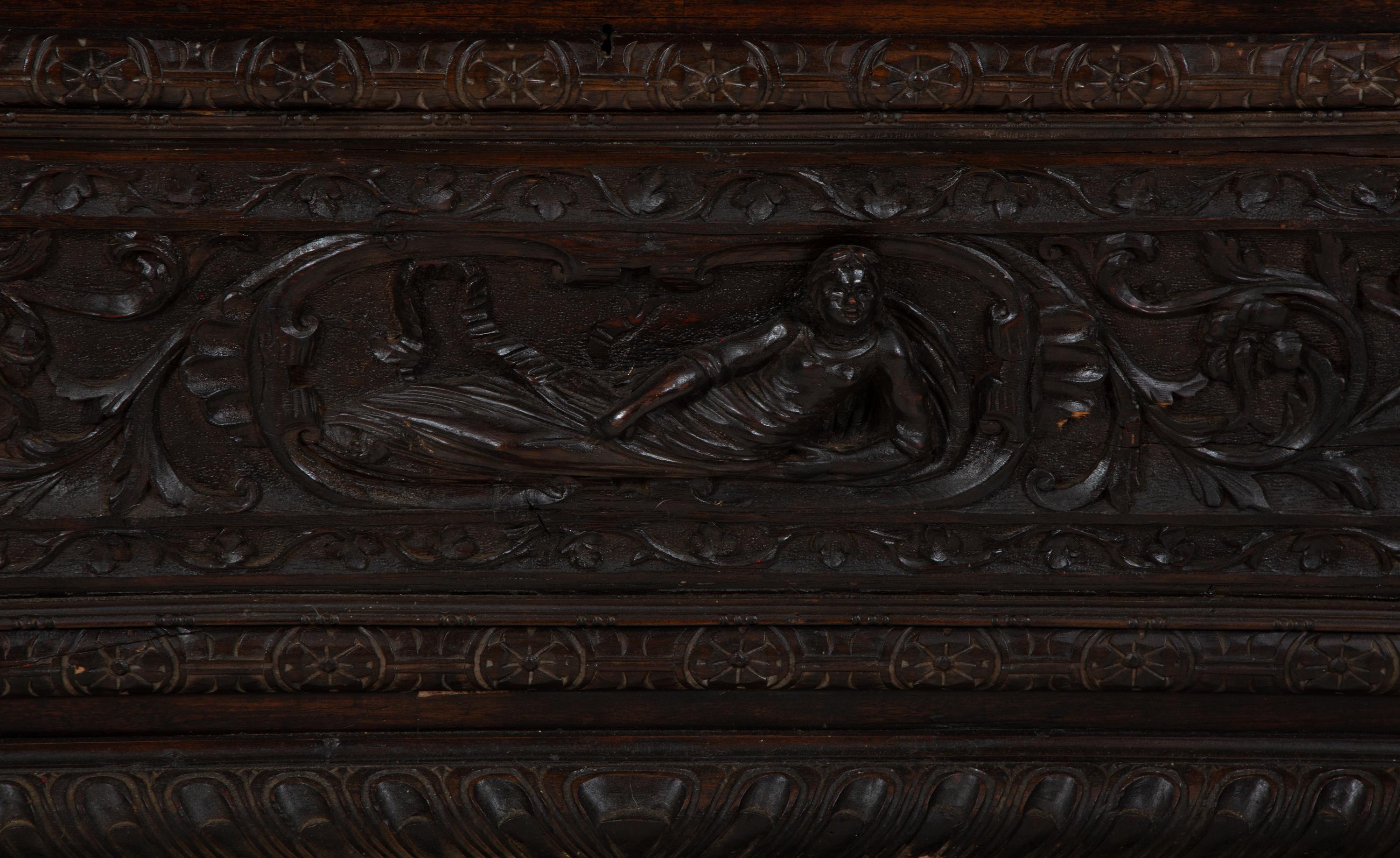 An Italian Renaissance Revival Carved Oak Cassone