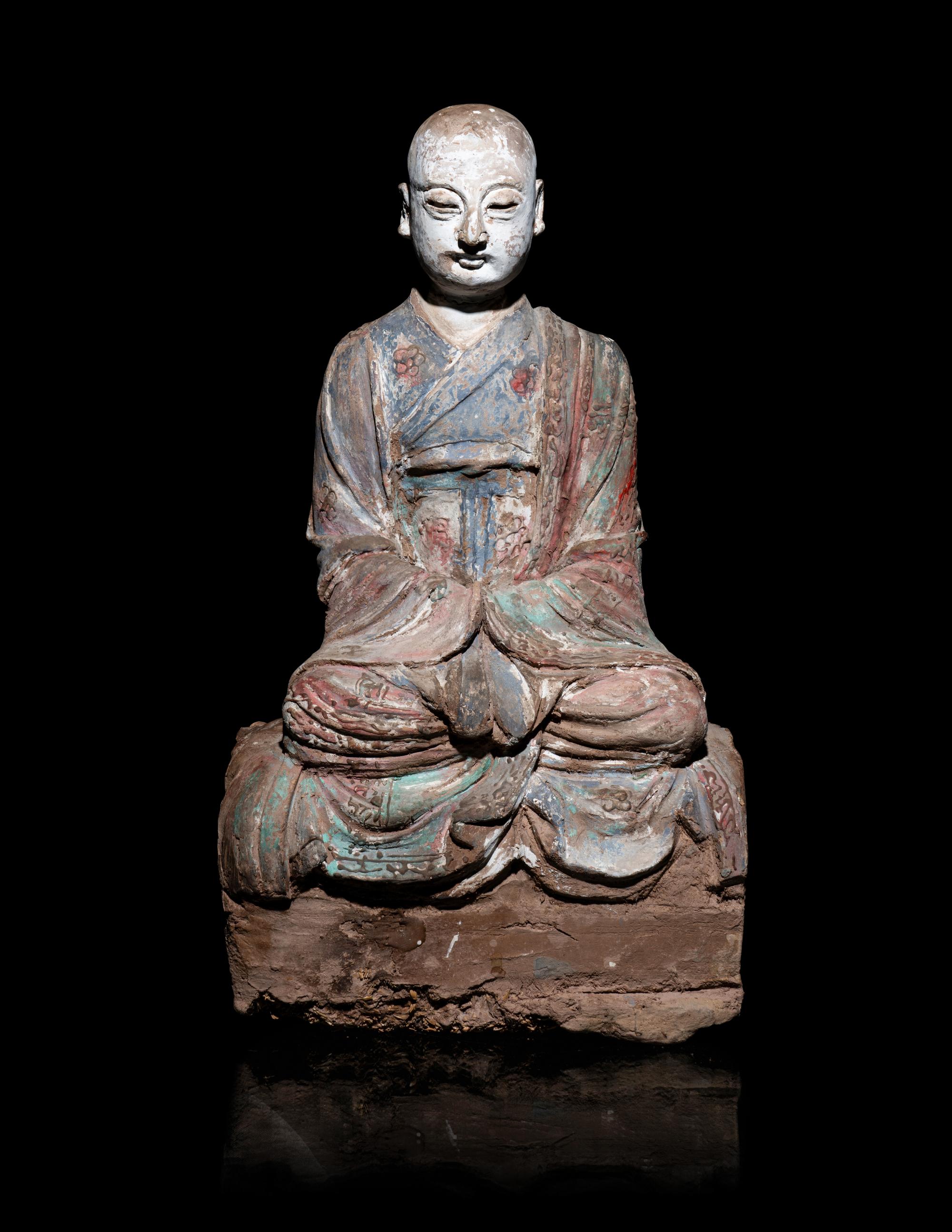 A Chinese Polychrome Painted Wood Figure of a Luohan
