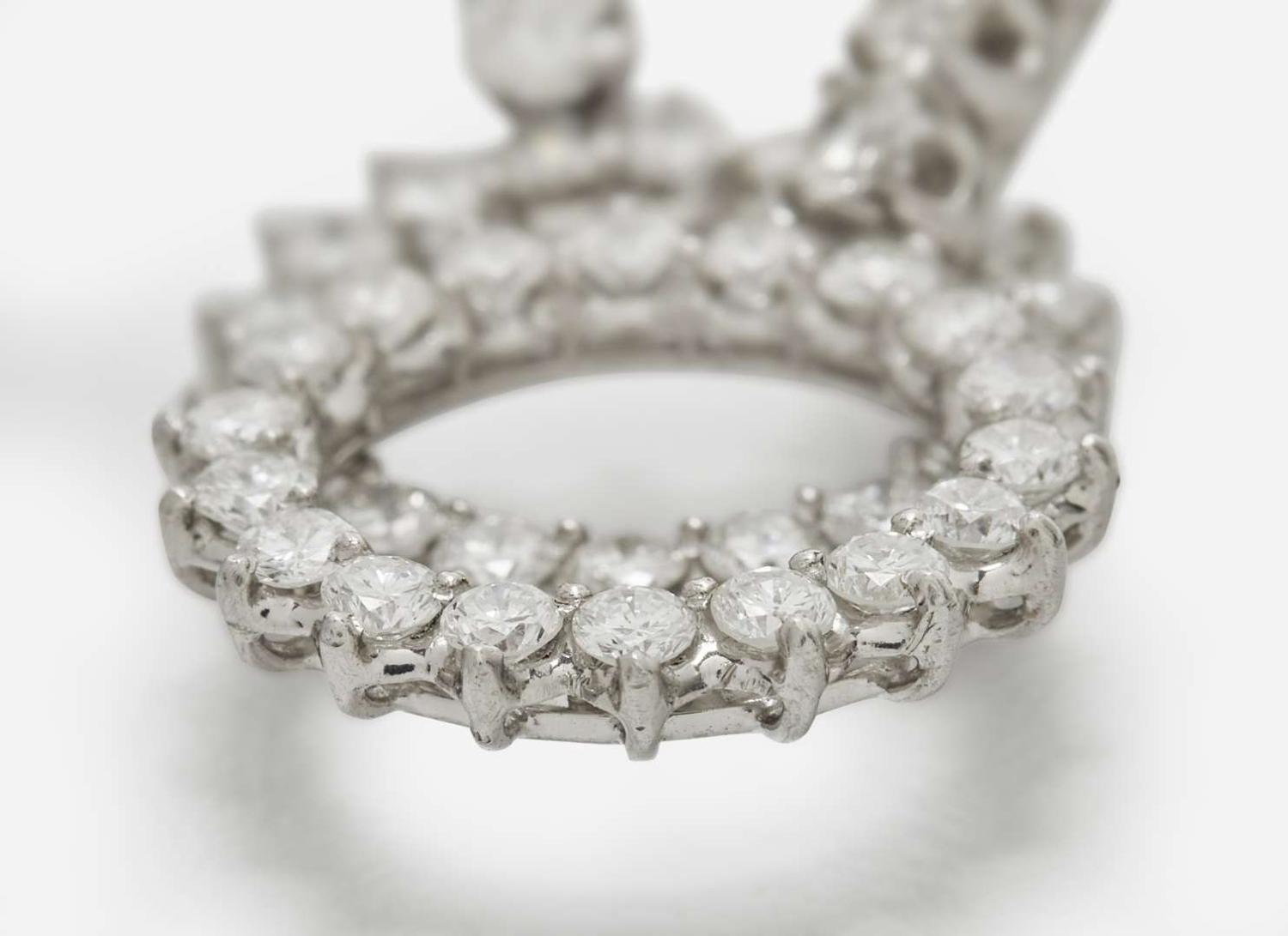 A Pair of 14K White Gold and Diamond Ear Clips