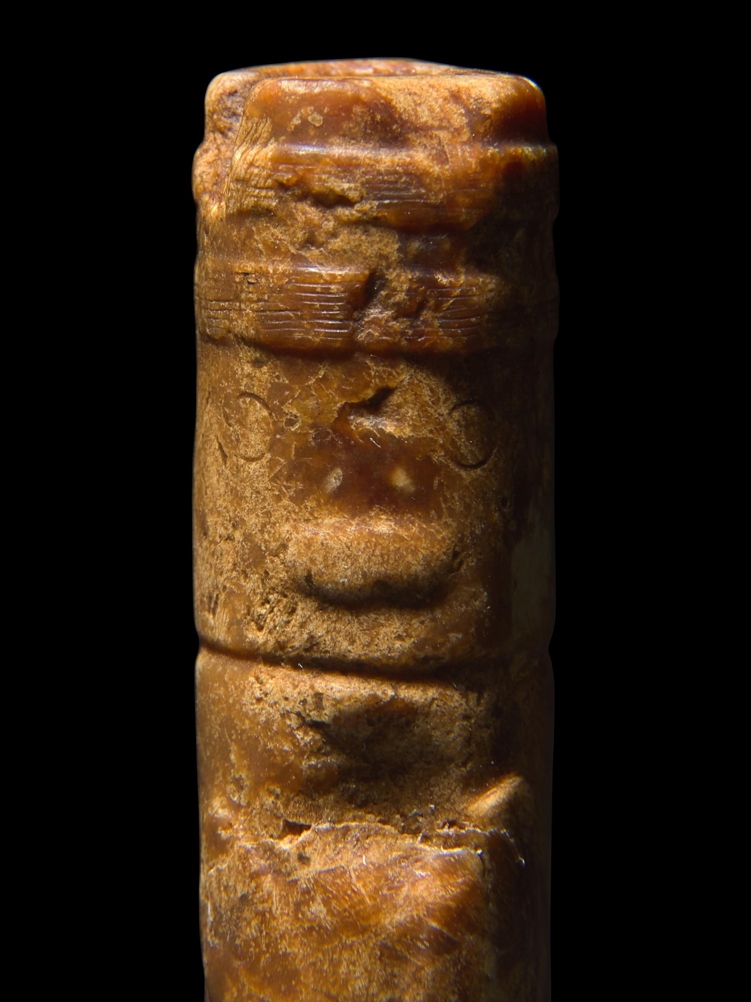 An Archaic Chinese Jade Pendant with Mask, Liangzhu Culture, and a Jade Jue, Western Zhou 良渚文化神人獸面紋玉勒及西周玉玨各一