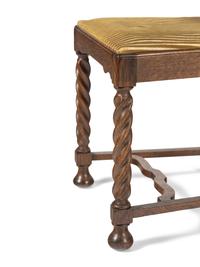 A Set of Eight William and Mary Style Oak Dining Chairs