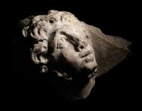 A Roman Marble Head of a Man in Relief