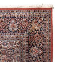 A Qom Wool and Silk Rug