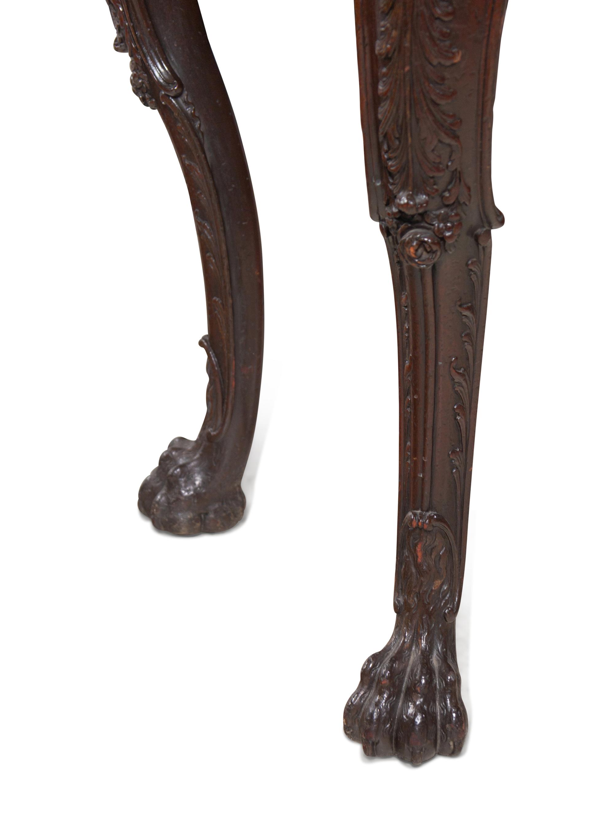 A Pair of George II Style Carved Walnut Marble-Top Pier Tables