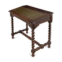 An Italian Carved Oak Writing Desk