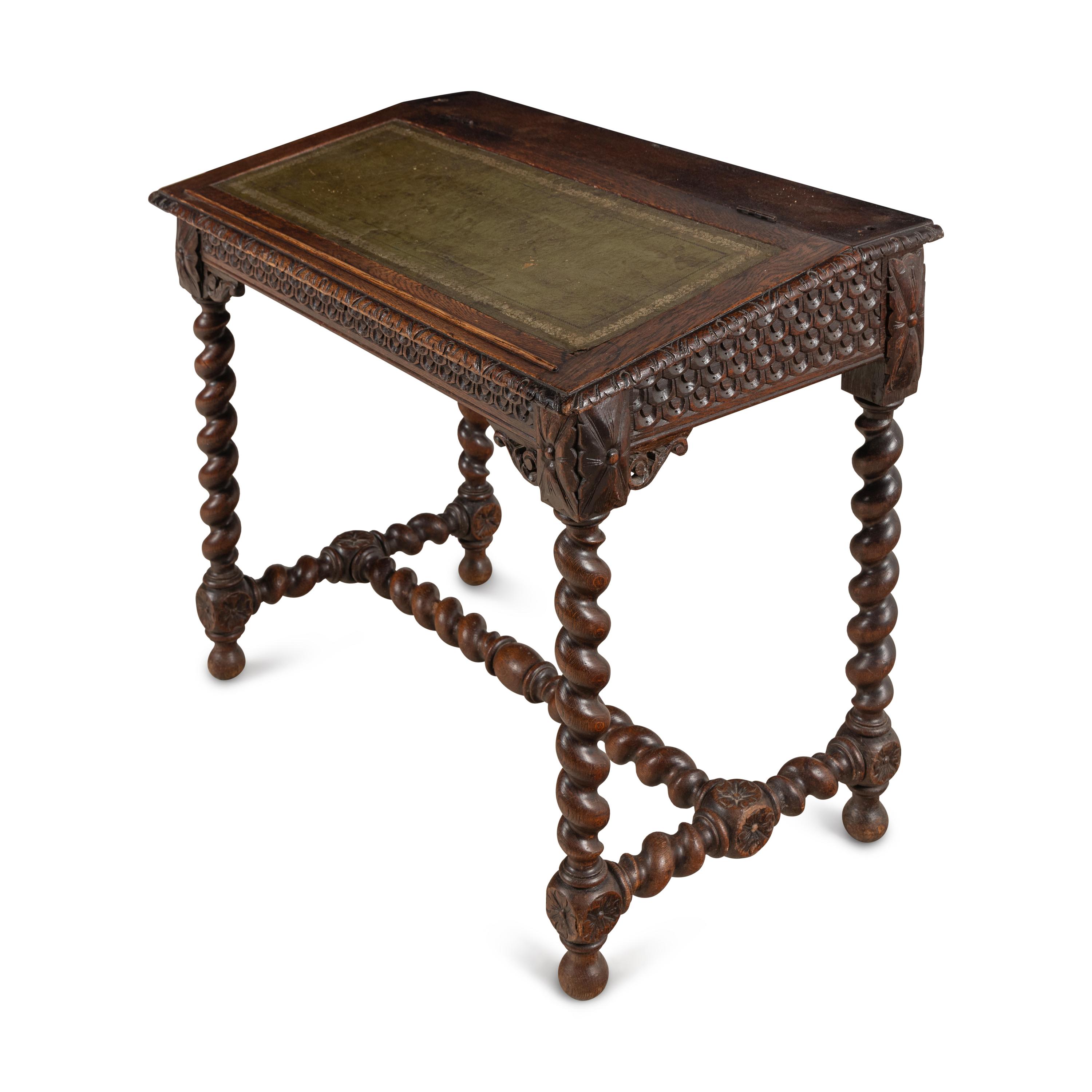 An Italian Carved Oak Writing Desk