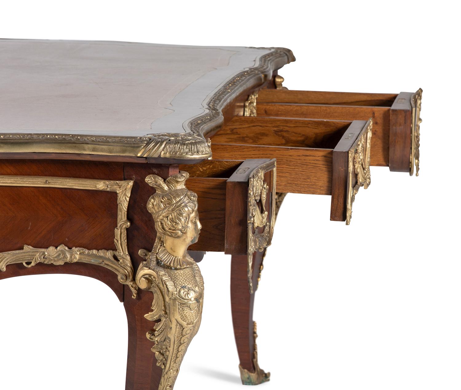 A Louis XV Style Gilt Bronze Mounted Mahogany Bureau Plat