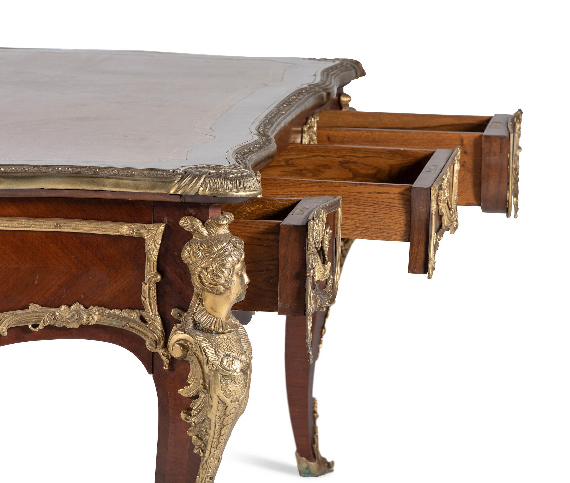 A Louis XV Style Gilt Bronze Mounted Mahogany Bureau Plat
