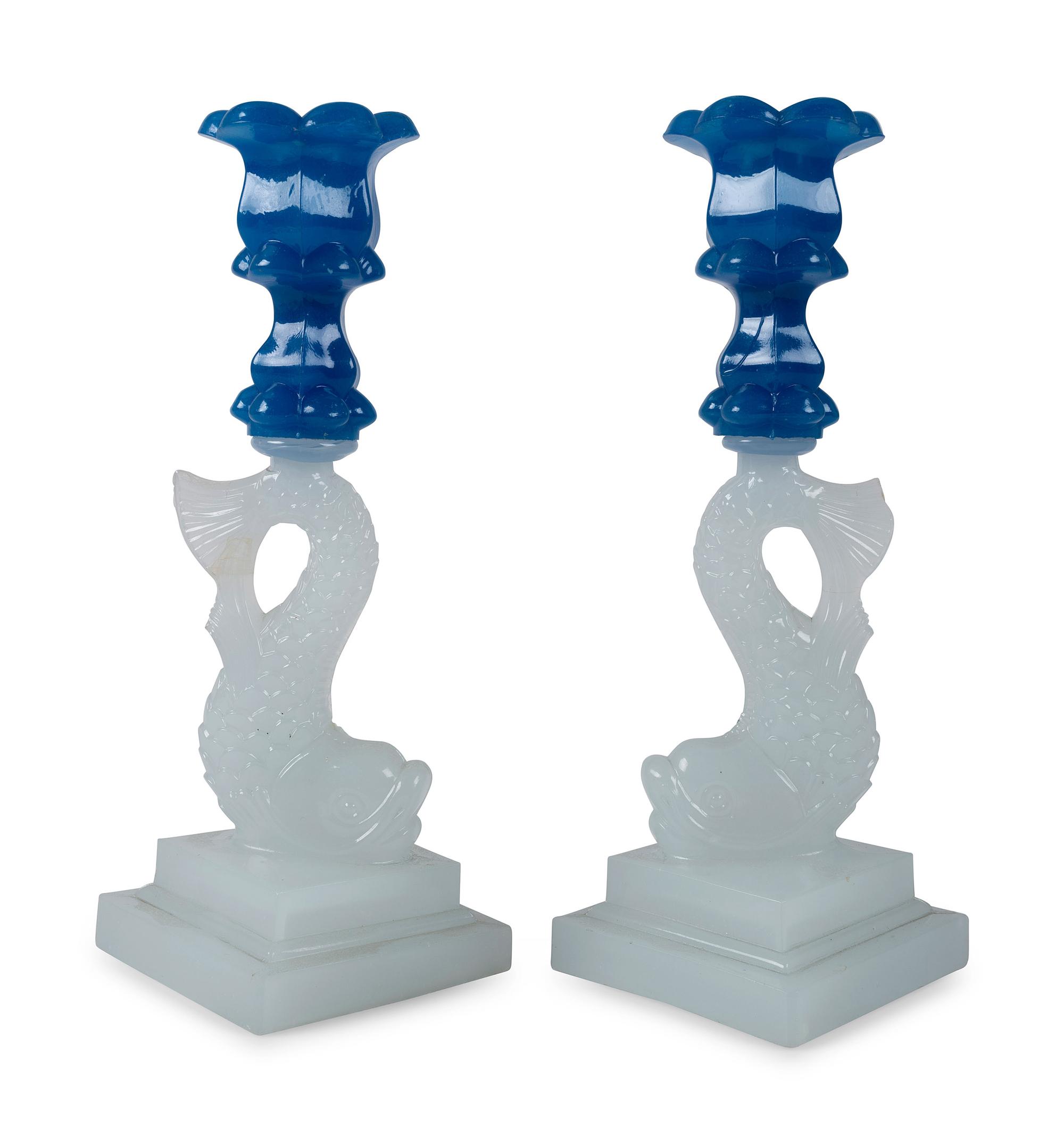 A Pair of Sandwich Glass Dolphin Candlesticks
