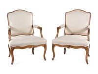 A Pair of Louis XV Carved Beechwood Fauteuils