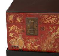 A Chinese Gilt-Decorated Red Leather Trunk on Black Lacquered Stand