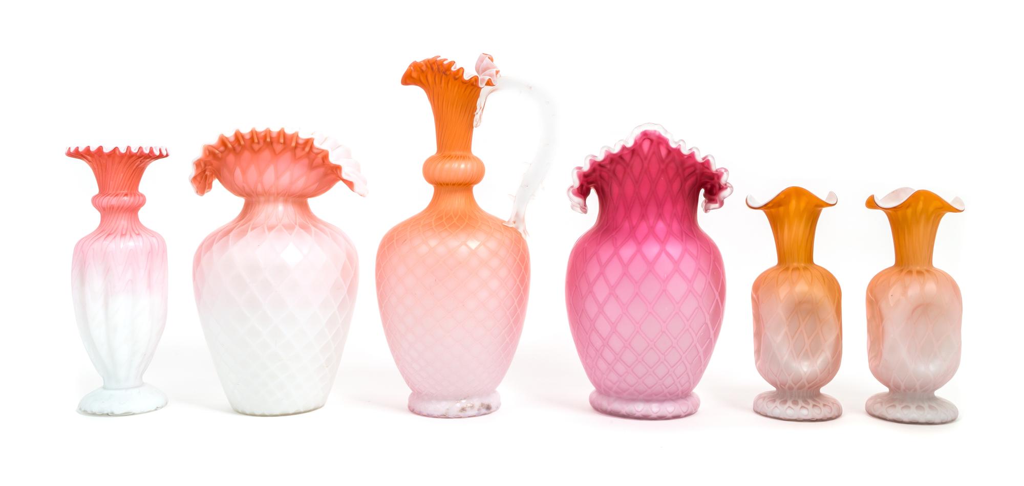 Six Victorian Mother-of-Pearl Satin Glass Articles Height of tallest 12 inches — 19TH CENTURY
