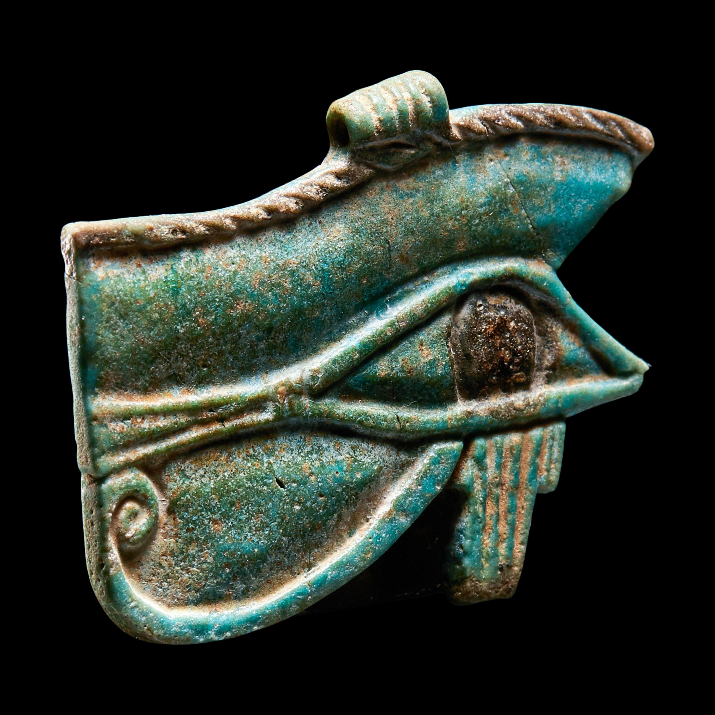 An Egyptian Faience Wadjet Eye Amulet