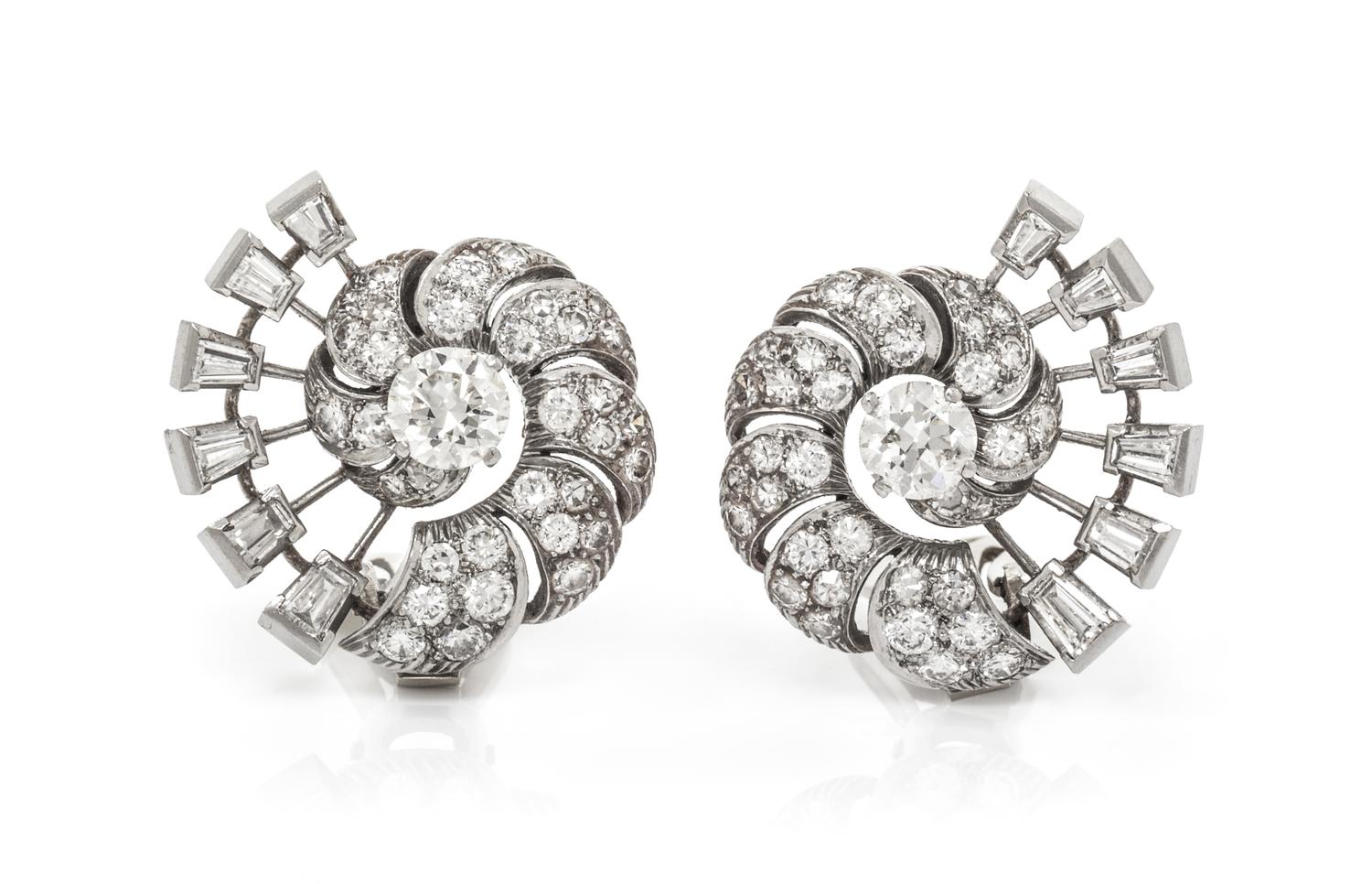A Pair of Platinum and Diamond Earclips, 9.90 dwts.