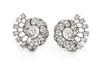 A Pair of Platinum and Diamond Earclips, 9.90 dwts.