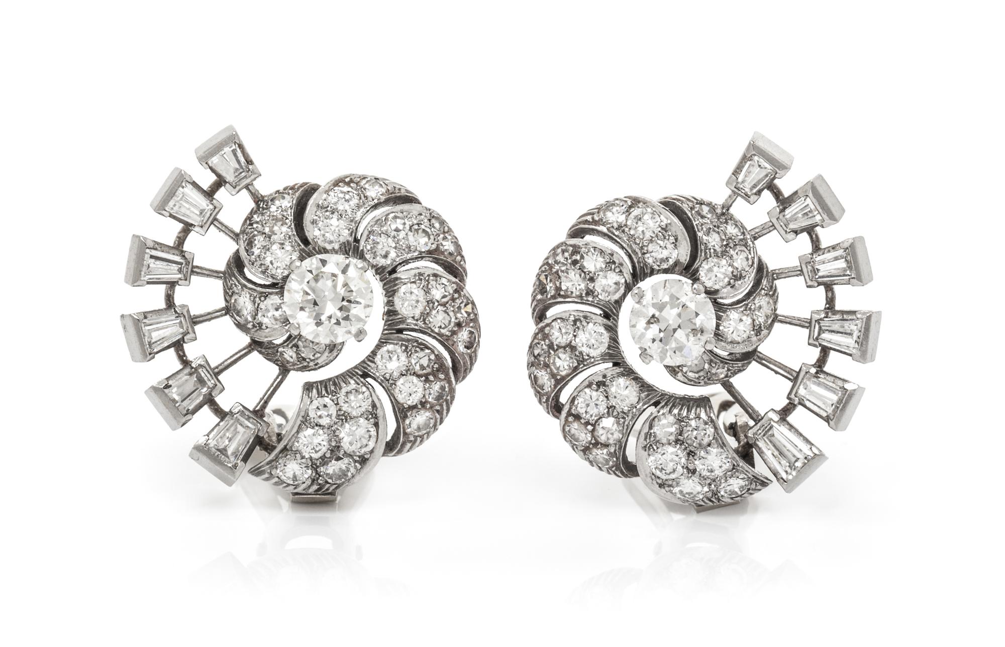 A Pair of Platinum and Diamond Earclips, 9.90 dwts.