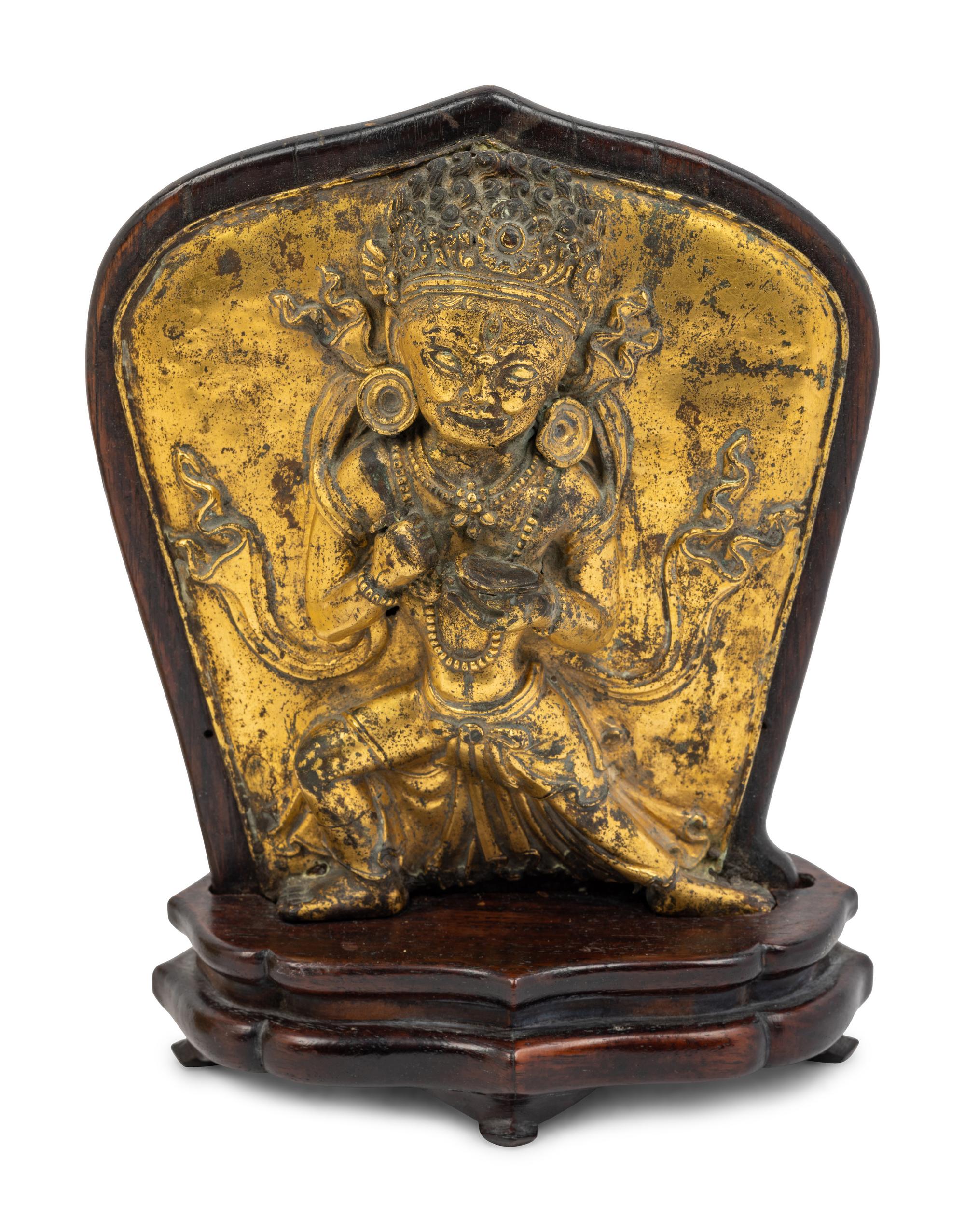 A Tibetan Gilt Bronze Repoussé Vajrapani Panel