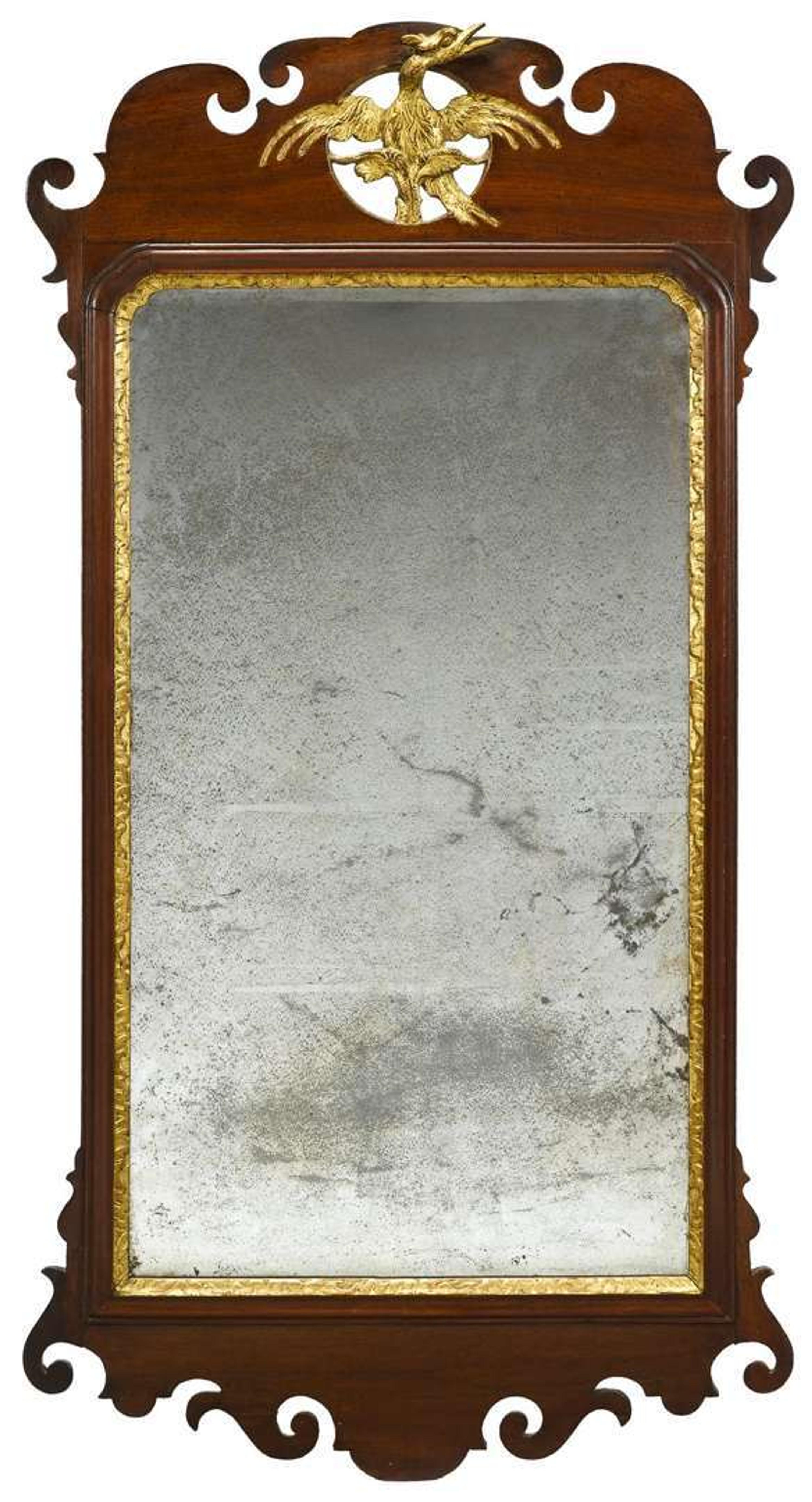 Chippendale mahogany and giltwood looking glass bearing printed label of john elliott (1713-1791), philadelphia, pa