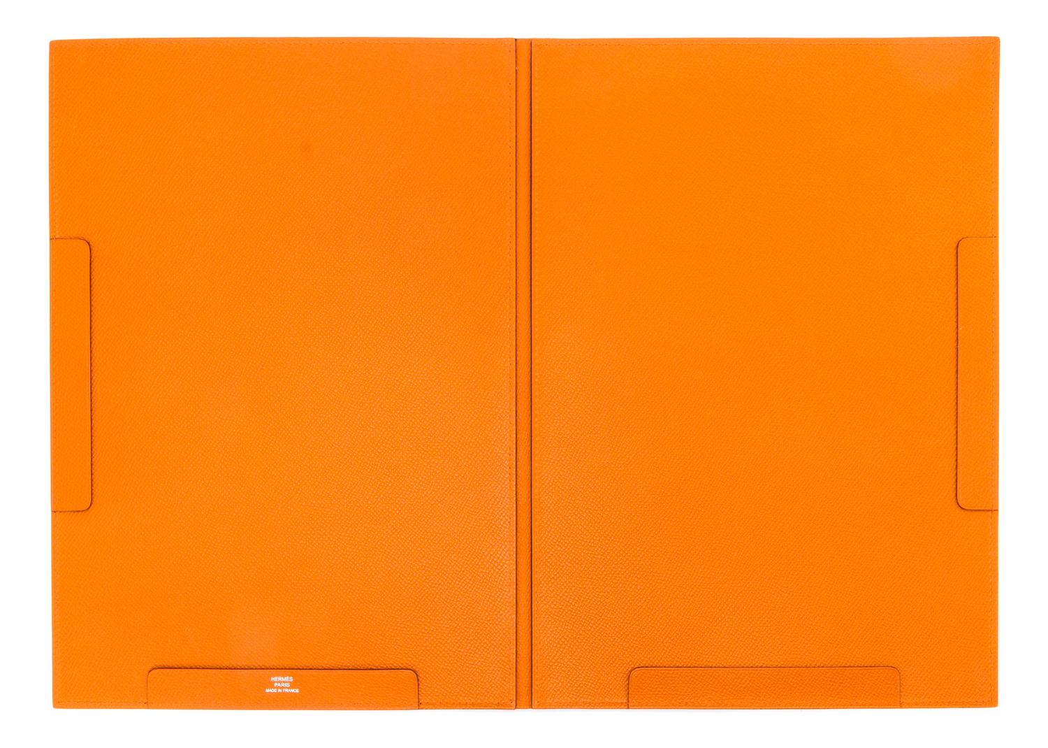 An Hermes Orange Leather Folio, 9" x 12.5" x .25".