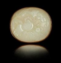 A White Jade Oval Plaque Length 3 inches. — 19TH CENTURY