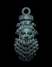 A Roman Bronze Applique Mask in the Form of Silenus