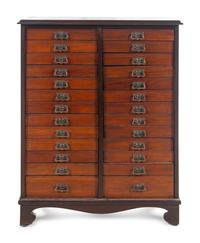 A Mahogany Collector's Cabinet