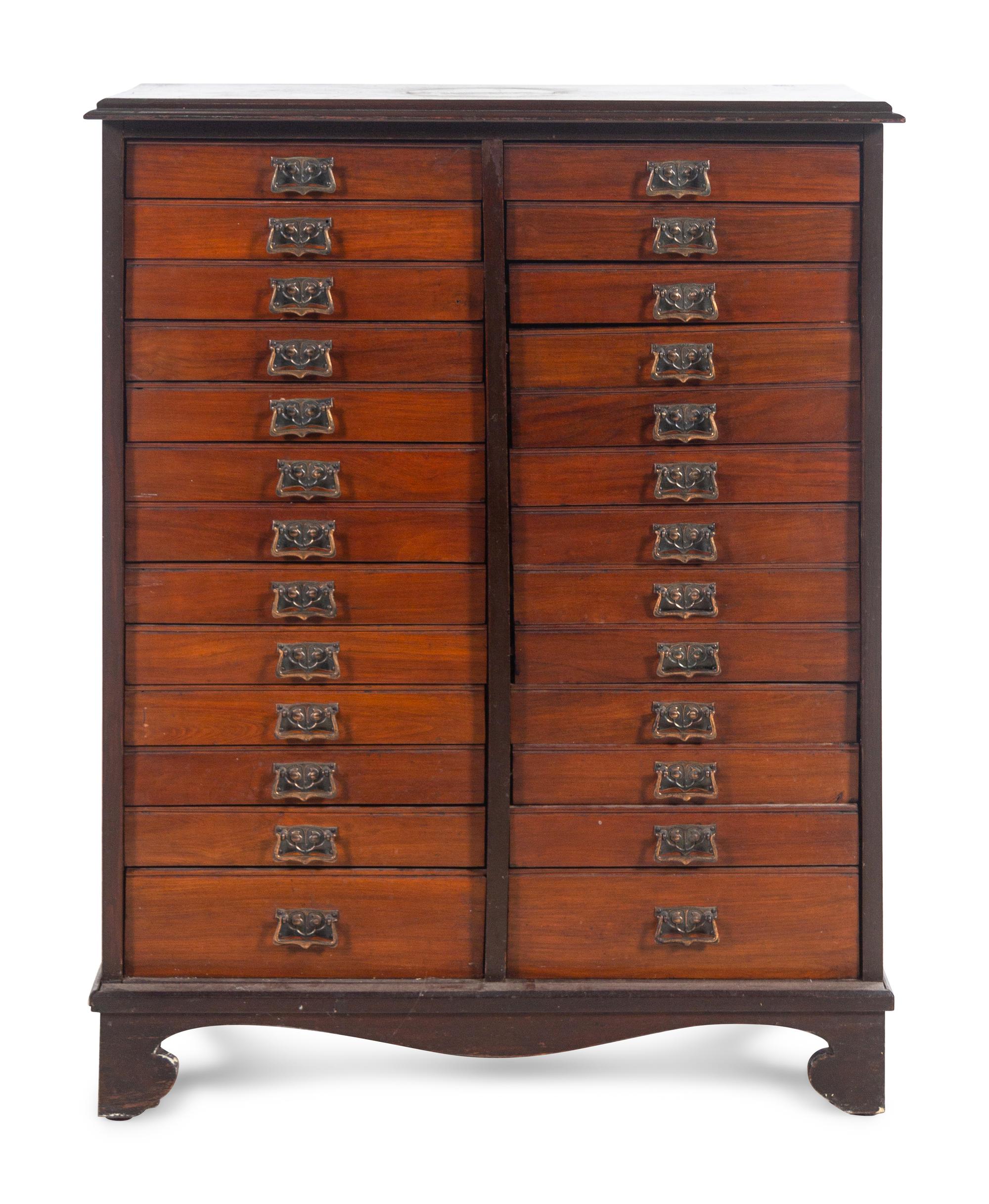 A Mahogany Collector's Cabinet