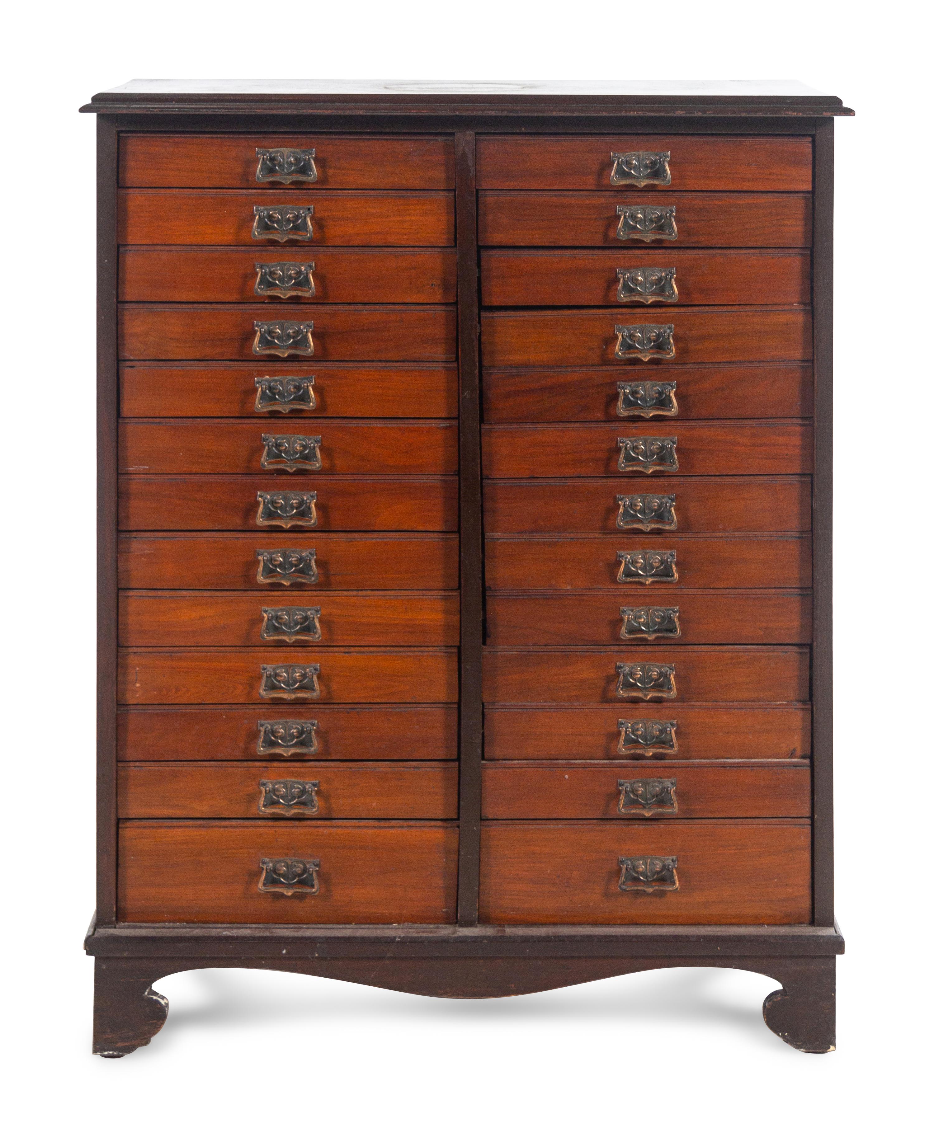 A Mahogany Collector's Cabinet