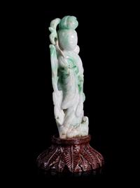 An Apple Green and White Jadeite Figure of a Lady Immortal