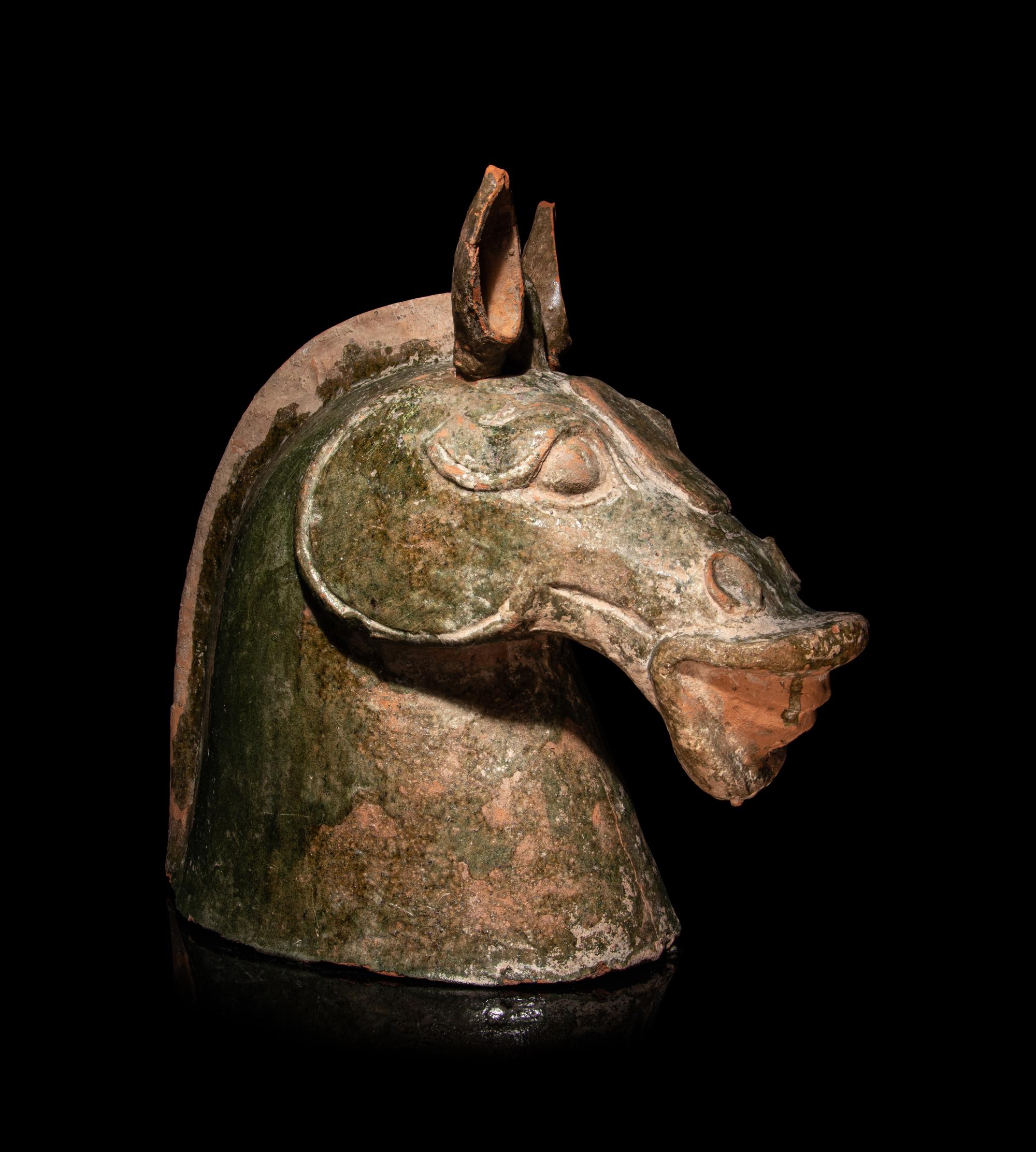 Three Chinese Pottery Equine Figures