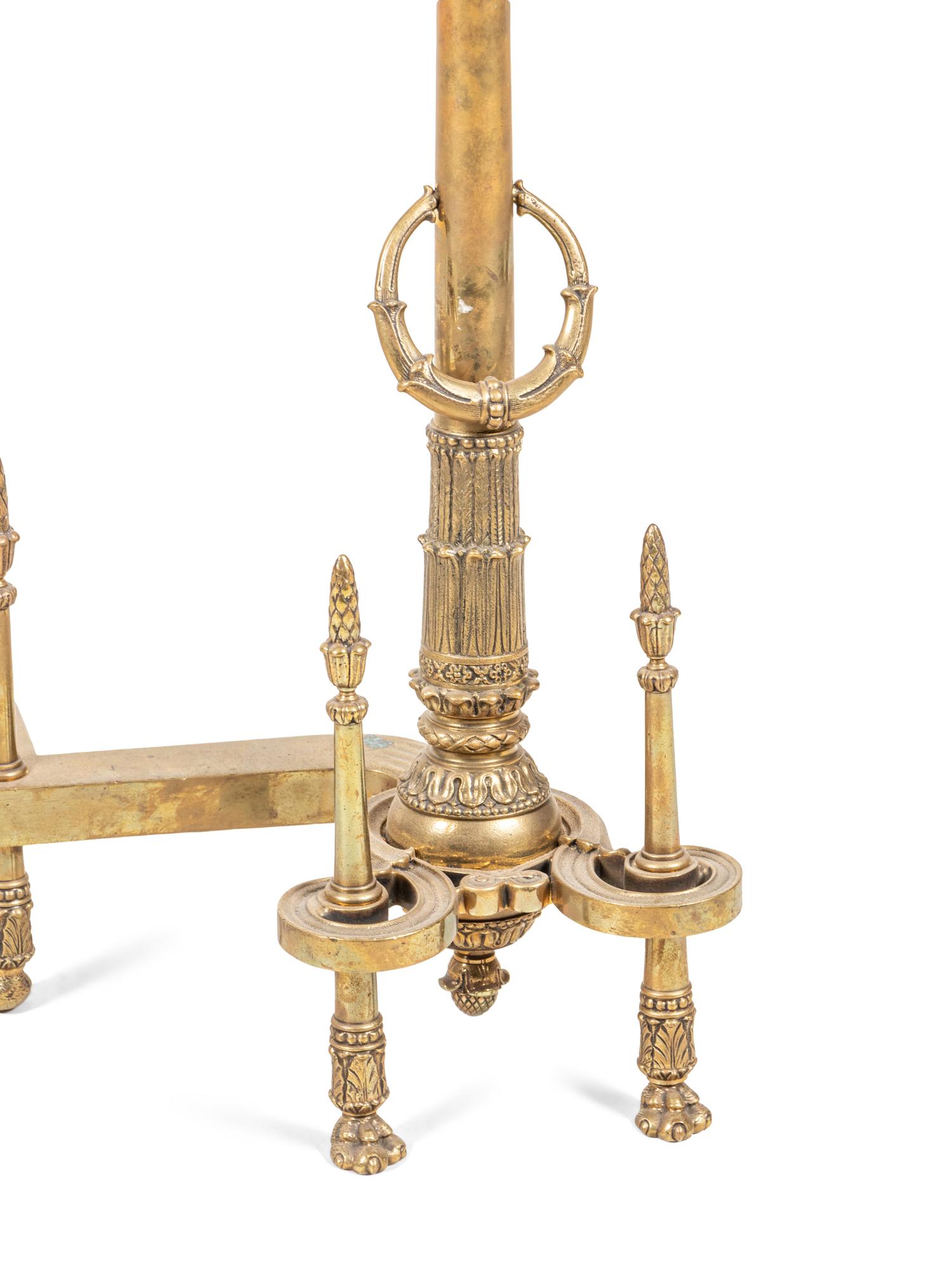 A Pair of Neoclassical Gilt Bronze Andirons with Wreath Ring Handles