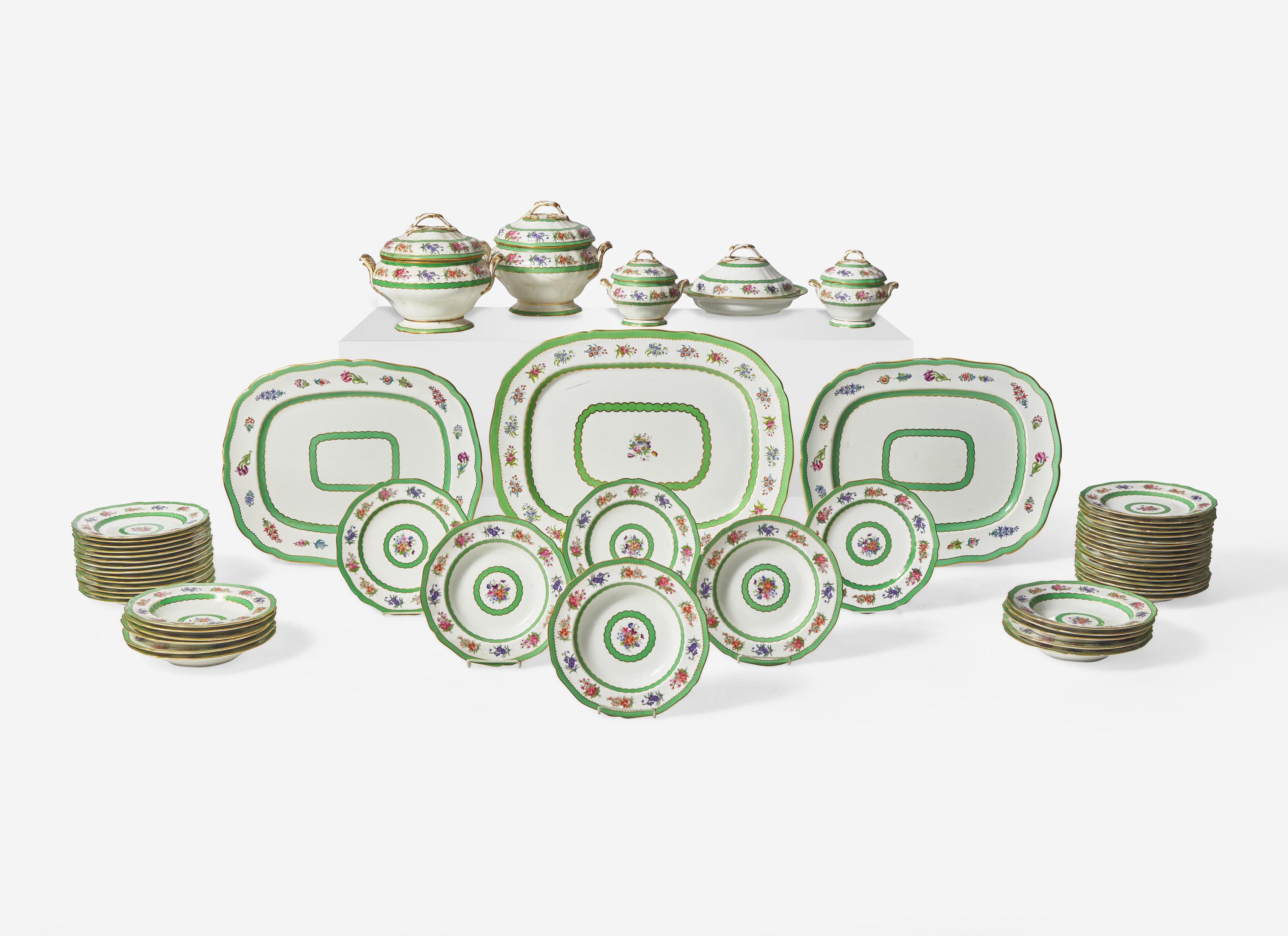 An English Floral Decorated and Parcel Gilt Creamware Dinner Service