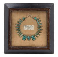 A Framed Egyptian Faience Bead Necklace Width overall 12 1/2 inches. — SAITE PERIOD, 26TH DYNASTY, CIRCA 600 B.C.E.
