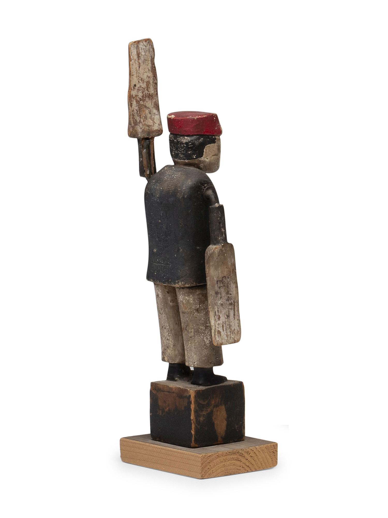 A Carved and Painted Wood Whirligig