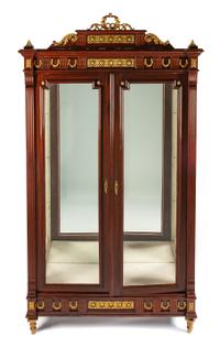 A Louis XVI Style Gilt Bronze Mounted Mahogany Vitrine Height 95 x width 53 x depth 18 inches. — LATE 19TH CENTURY
