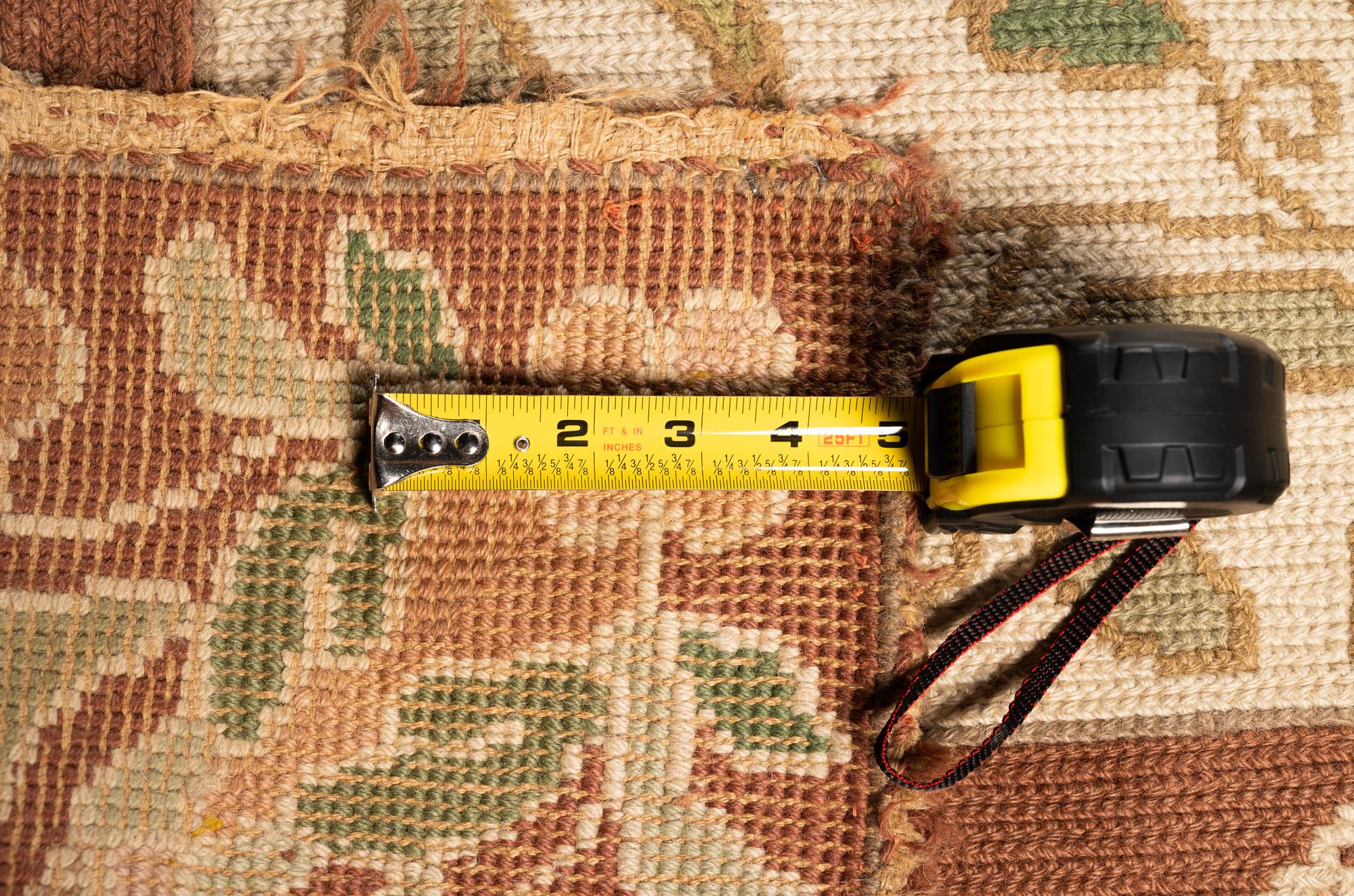 A Portuguese Needlepoint Rug