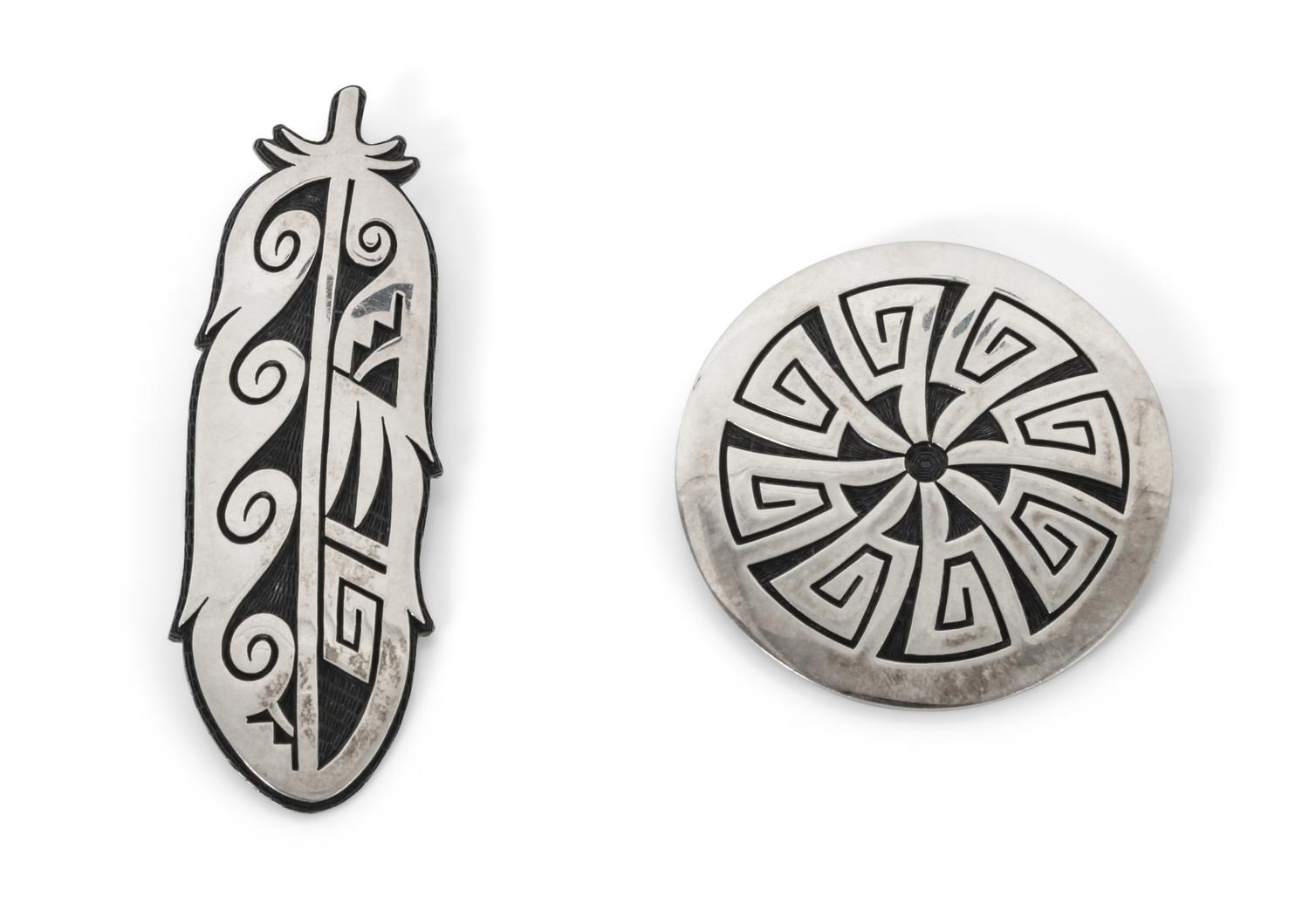 Two Hopi Silver Overlay Pendant/Brooches, Ramon Dalangyawma Length of longest 3 3/8 inches.