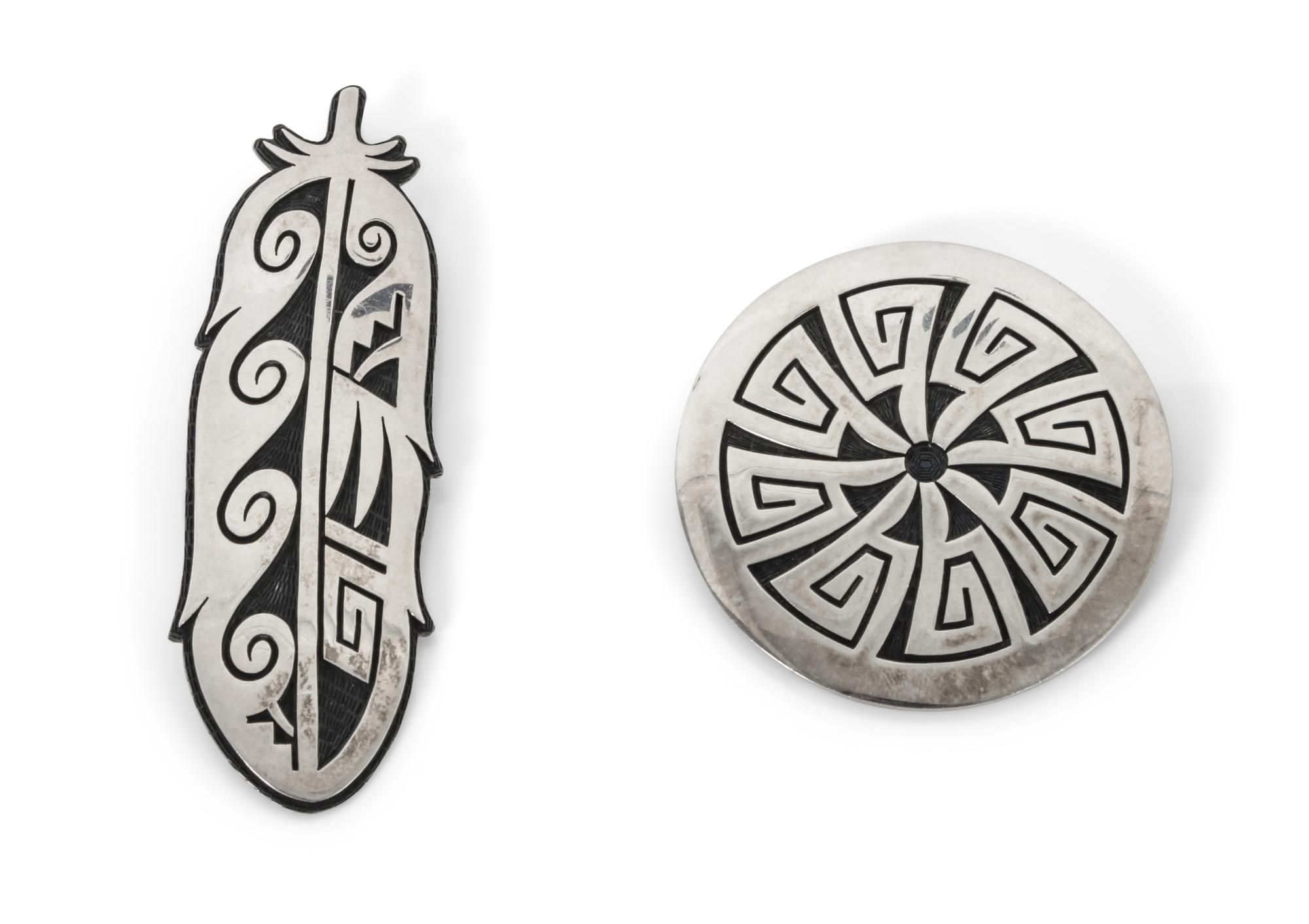 Two Hopi Silver Overlay Pendant/Brooches, Ramon Dalangyawma Length of longest 3 3/8 inches.