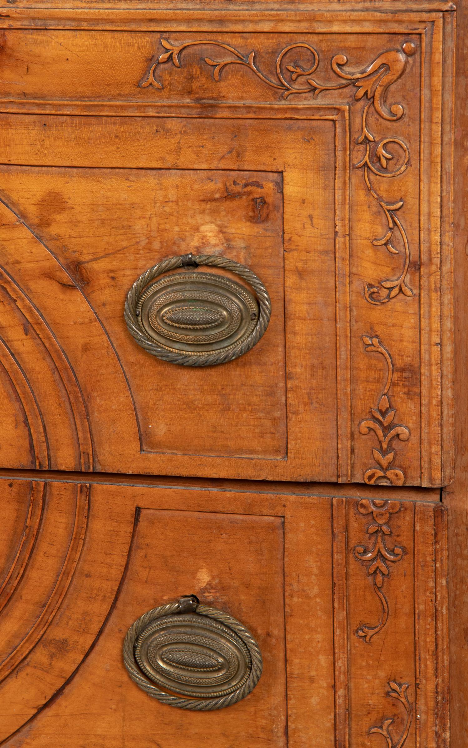 An Italian Carved Fruitwood Marble-Top Commode