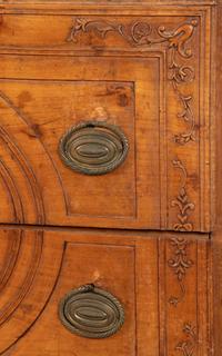 An Italian Carved Fruitwood Marble-Top Commode