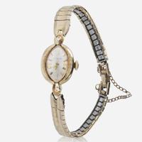 A 14K Yellow Gold Ladies Watch by Le Coultre