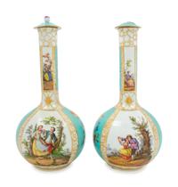 A Pair of German Porcelain Covered Vases