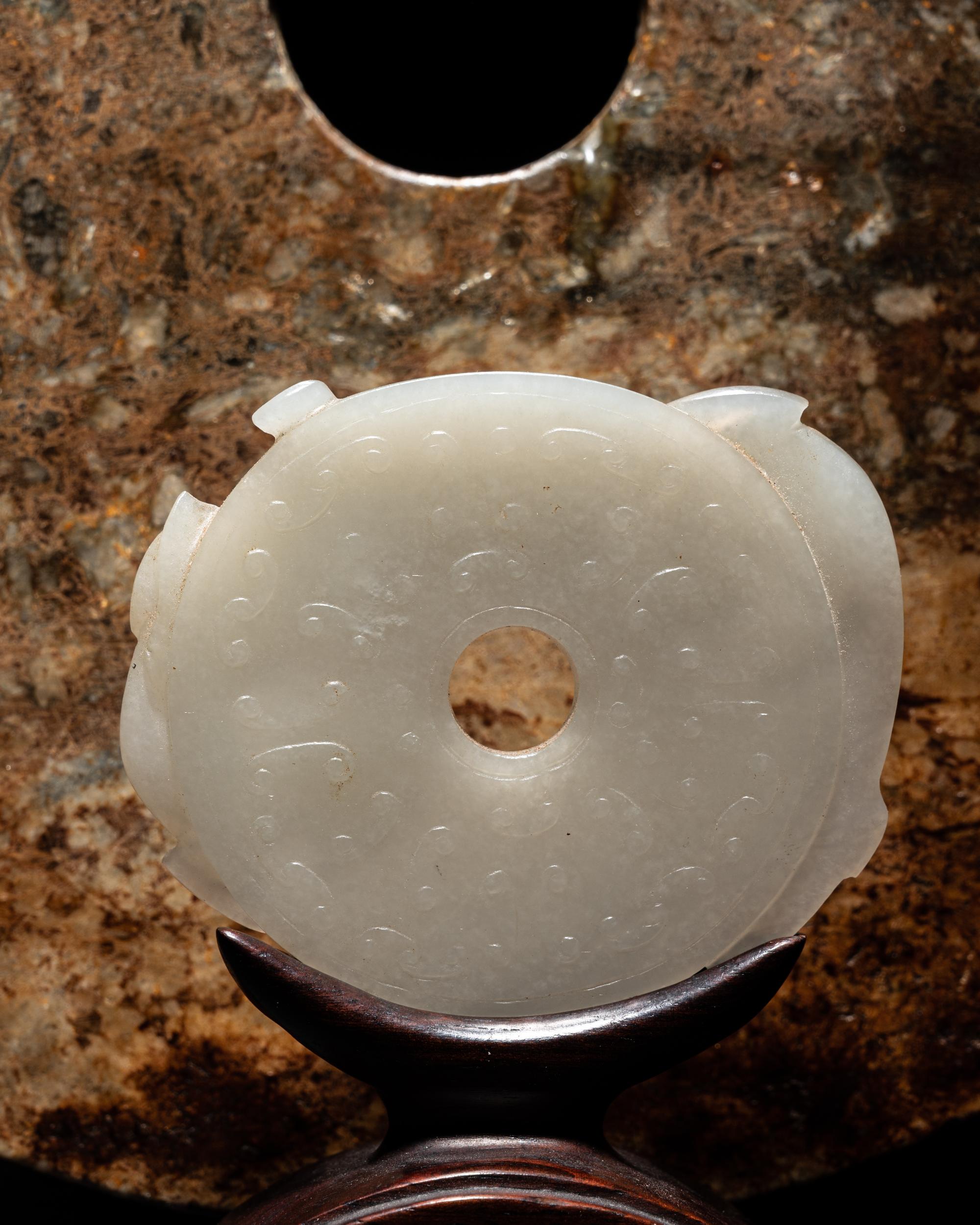 A Chinese Carved White Jade 'Chilong' Pendant and and Archaistic Jade Bi Disc